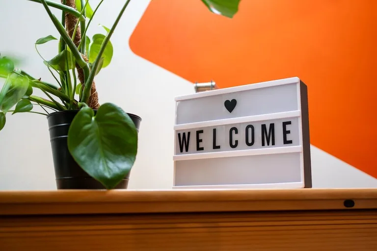 Welcome sign with a heart in the Resolution studio